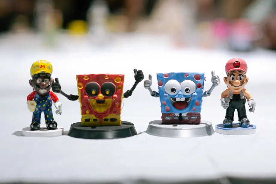 Painted figurines showing different colour ideas