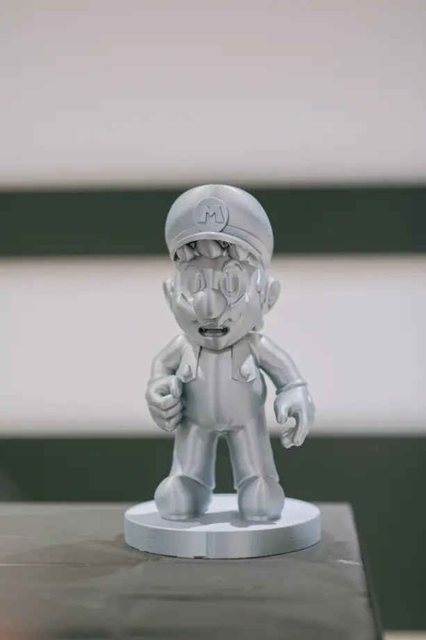 Unpainted Overall Buddy figure. One figure is included in your selected size.