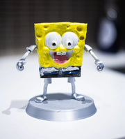 Painted example of Square Buddy for colour inspiration. Your figure arrives unpainted.