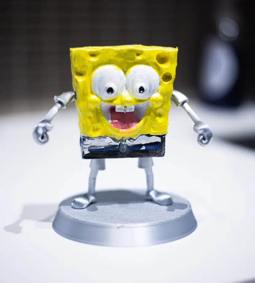 Painted example of Square Buddy for colour inspiration. Your figure arrives unpainted.
